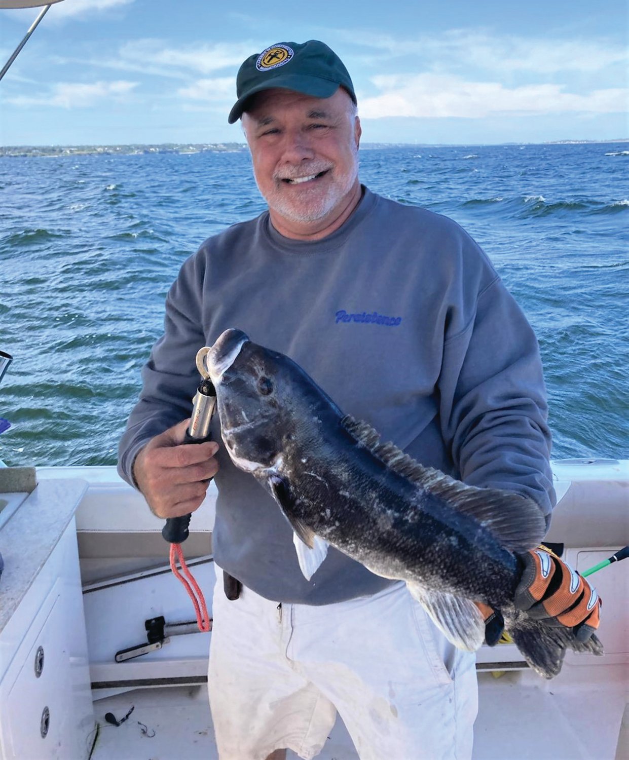 TAUTOG BITE STRONG: Greg Spier of Foxborough, Massachusetts, and Portsmouth, Rhode Island, with a 5.10 pound tautog he caught at the mouth of the Sakonnet River this week in 22 feet of water. The water was still warm, 71 degrees.